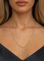 Sword of the Spirit Medallion in gold, worn on a necklace, symbolizing strength through Scripture.
