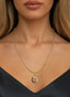 4:14 Medallion in 14K gold, worn on a necklace, expressing the beauty of devotion.