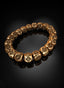 Gold Cross of Faith bracelet, angled to see interior and exterior craftsmanship.