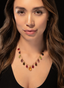 Model wearing multi-color tourmaline fringe necklace, showcasing drape, craftsmanship and beauty.