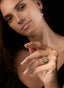 Rose cut diamond ring on a model's finger, displaying beauty and fine details.