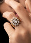 Close-up of rose cut diamond ring, showcasing intricate craftsmanship and antique finish.
