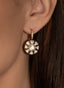 Close-up of rose cut diamond earrings, showcasing intricate craftsmanship and antique finish.