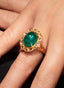 Model wearing emerald and rose-cut diamond ring, displaying size, proportion, and elegance.