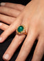 Close-up of 9.64 ct emerald and rose cut diamond ring, showcasing beauty and fine craftsmanship.