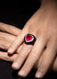 Model wearing rubellite and onyx ring, displaying size, proportion, and elegance.