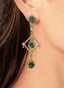 Model wearing emerald and diamond earrings in 18K yellow gold and silver, antique finish.