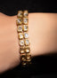 Rose cut diamond double strand bracelet in gold, with an old-world Victorian-style antique finish.