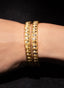 Close-up of a pair of rose cut diamond bangles, showcasing intricate details and craftsmanship.
