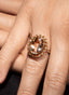 Close-up of morganite and diamond ring, showcasing beautiful hand craftsmanship.