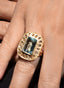 Close-up of aquamarine and diamond ring, showing its elegance and vibrant color.