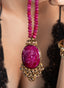 390 ct ruby necklace with 3.5 ct of white sapphires, displaying size, proportion, and elegance.