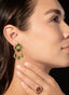 Model wearing peridot and diamond drop earrings, displaying size, proportion, and elegance.