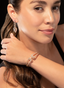 Diamond cuff bracelet in 18K gold on model’s wrist, showcasing its elegant design and proportions.