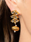 Close-up of rose cut diamond drop earrings, showcasing intricate craftsmanship and antique finish.