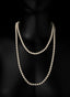 Gold freshwater pearl necklace in double loop, a symbol of divine worth.
