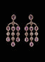 7.07 ct pink sapphire and diamond rainfall earrings against black, highlighting gemstone brilliance.