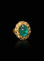 9.64 ct emerald and rose cut diamond ring on black background, highlighting gemstone beauty.