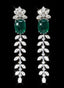 14.48 carat emerald and diamond earrings in 18K white gold, displayed against a black background.