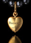 Back of Heart’s Desire Medallion in 14K gold, with Psalm 20:4 embossed, expressing God's blessings.