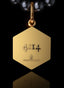 Back of 4:14 Medallion in 14K gold, engraved with the 4:14 scripture, symbolizing faithful devotion.