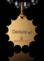 Back of the Genesis Medallion in 14K gold, with Genesis 49 embossed, symbolizing divine authority.