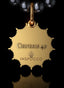 Back of The Genesis Medallion in 14K gold, with Genesis 49 embossed, symbolizing divine authority.