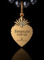Back of Revelation Medallion in 14K gold, with Ephesians 1:18-21 embossed, expressing renewal.