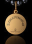 Back of Roots & Branches Medallion in 14K gold, Romans 11:16-18 embossed, expressing God's grace.